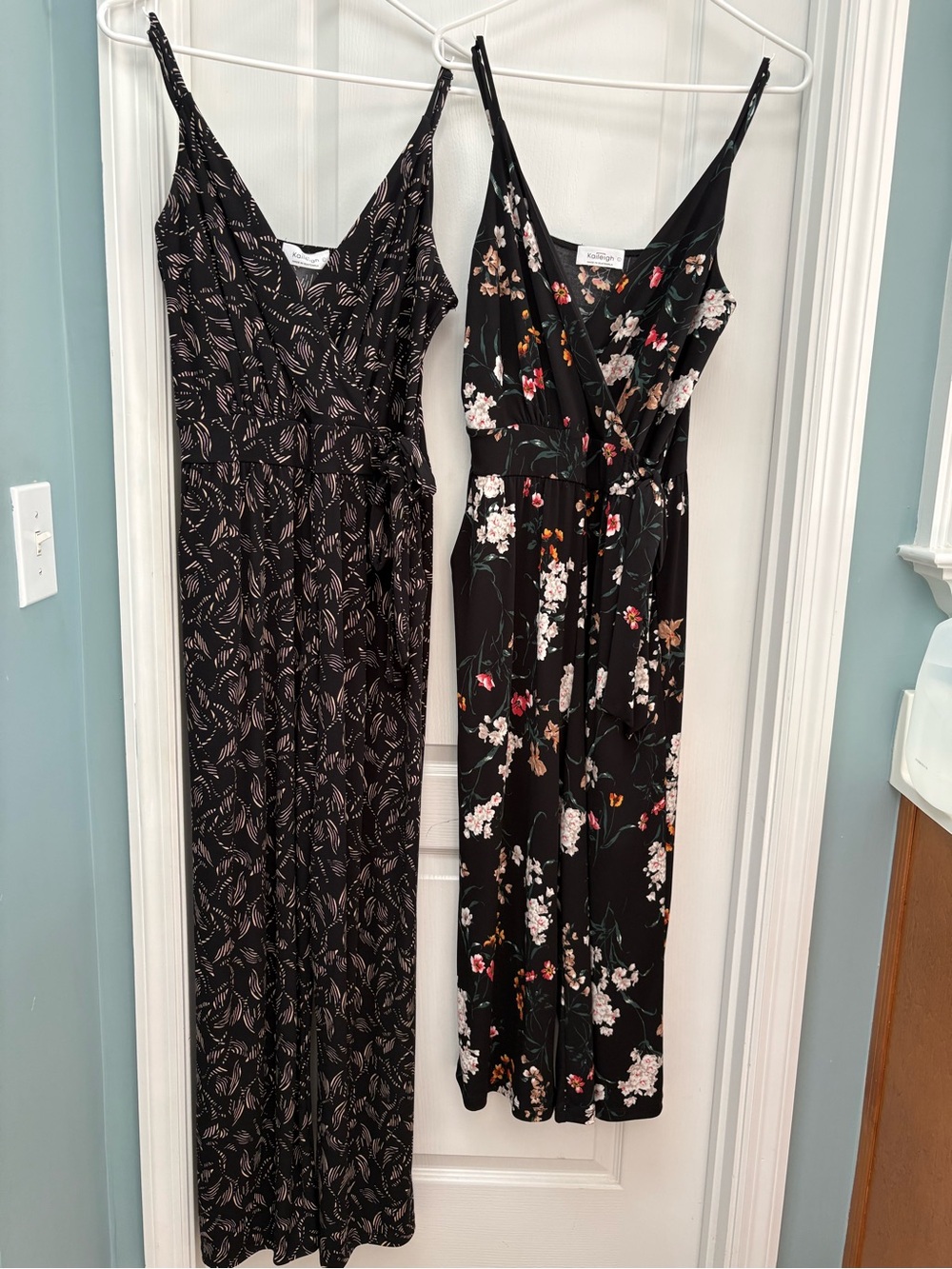 Set of Two Kaileigh Black Wrap Jumpsuits - Floral and Gold Accents